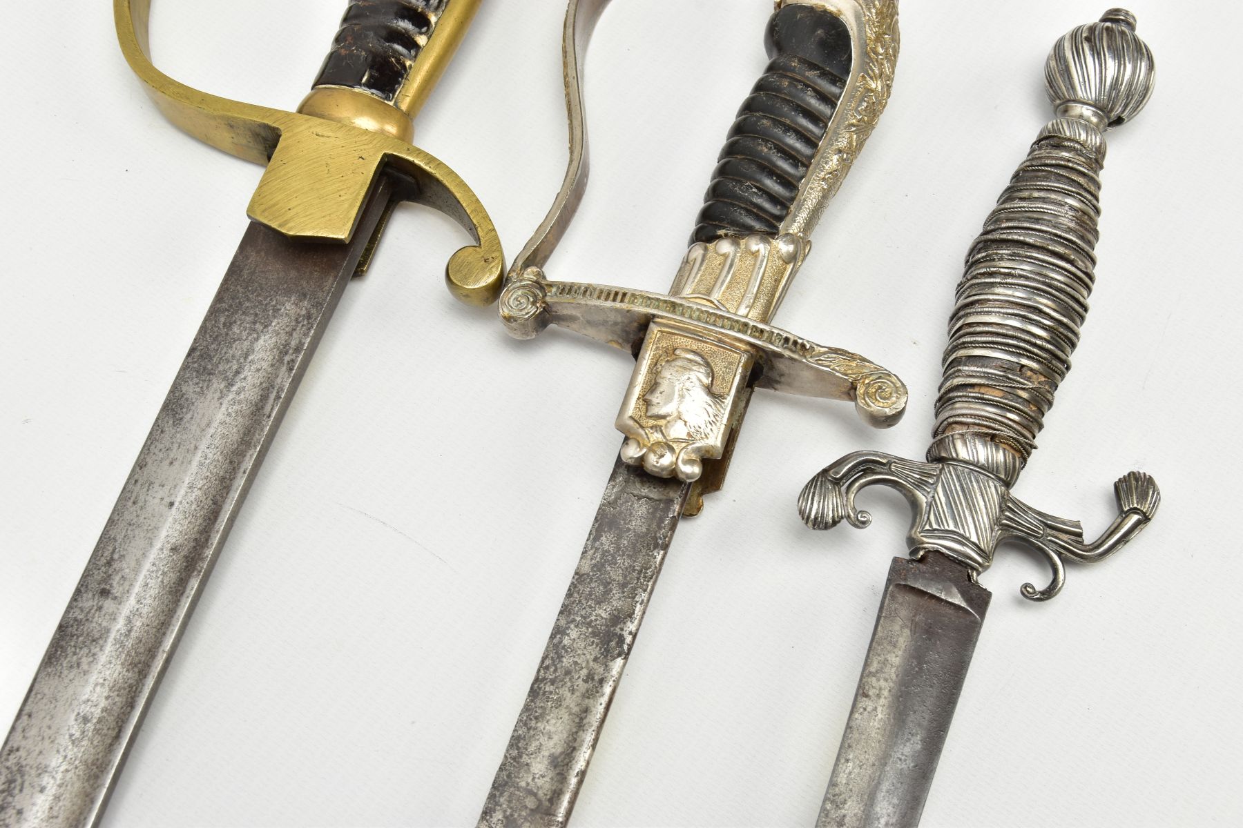 THREE SWORDS BELIEVED 19TH Century, a white metal ornate grip and cross guard blade tip broken, - Image 3 of 12