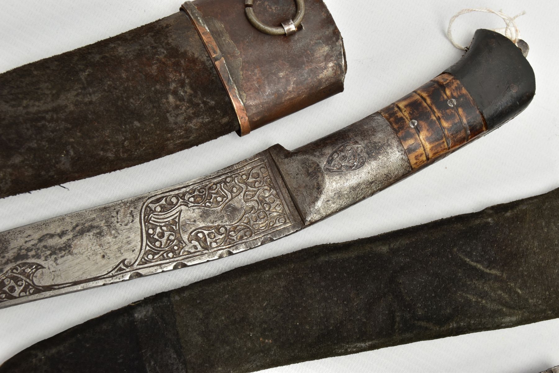 THREE INDIAN/ASIAN short daggers all with skin covered wooden scabbards, all curved and etched - Image 2 of 9