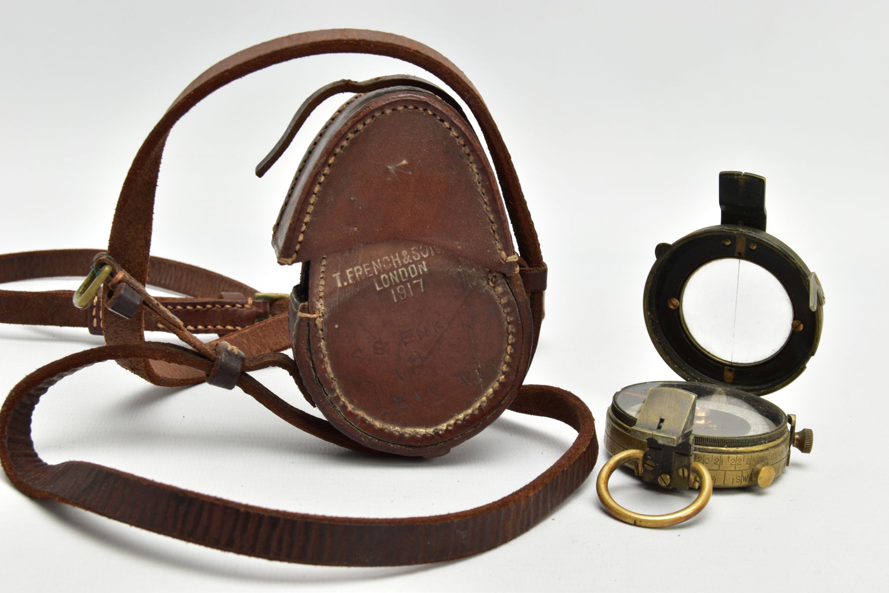 A WORLD WAR ONE ERA FIELD COMPASS, WAR OFFICE, DATED 1917, in its correct brown leather carrying - Image 5 of 6
