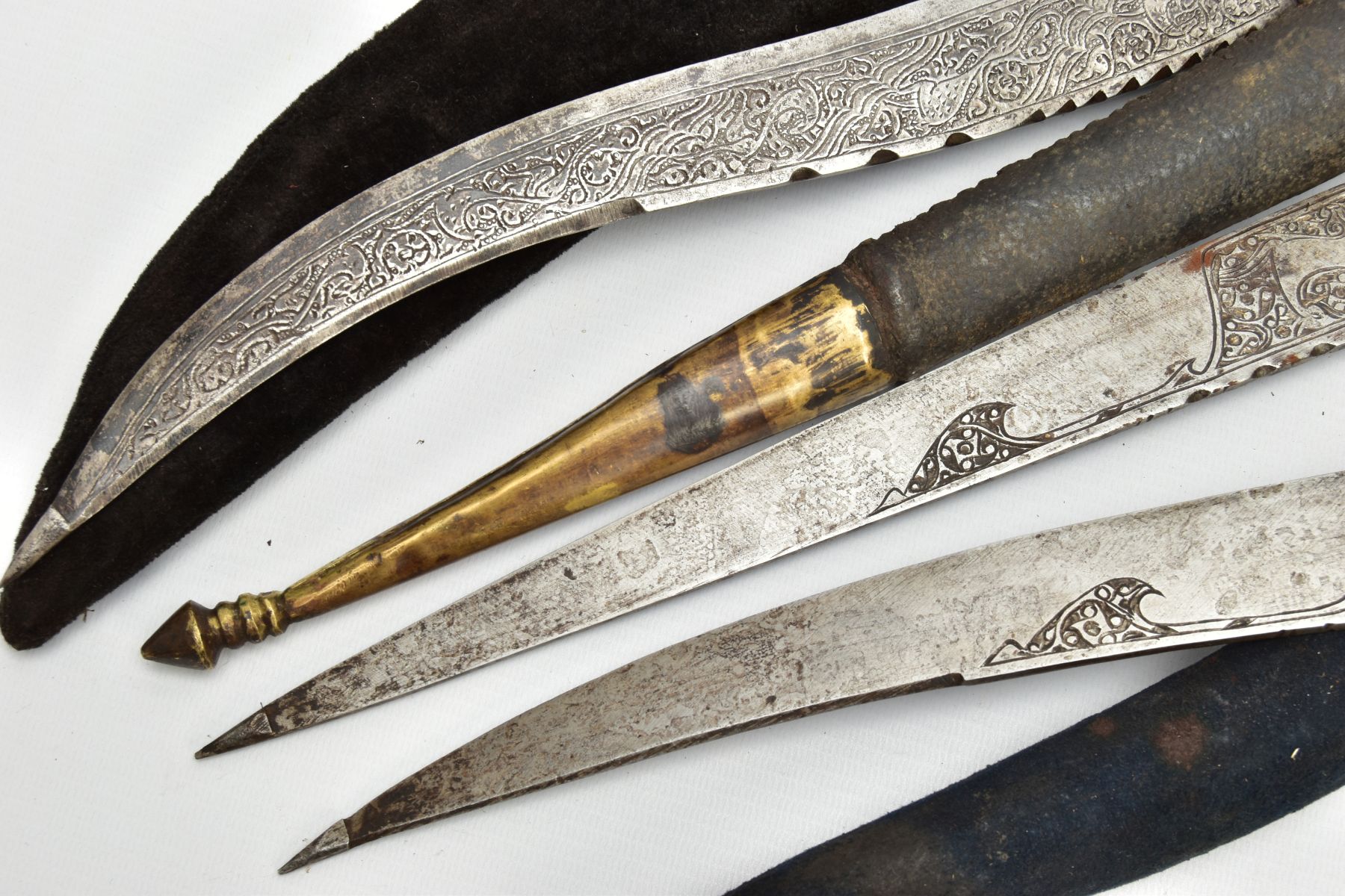 THREE INDIAN/ASIAN short daggers all with skin covered wooden scabbards, one with straight blade - Image 5 of 9