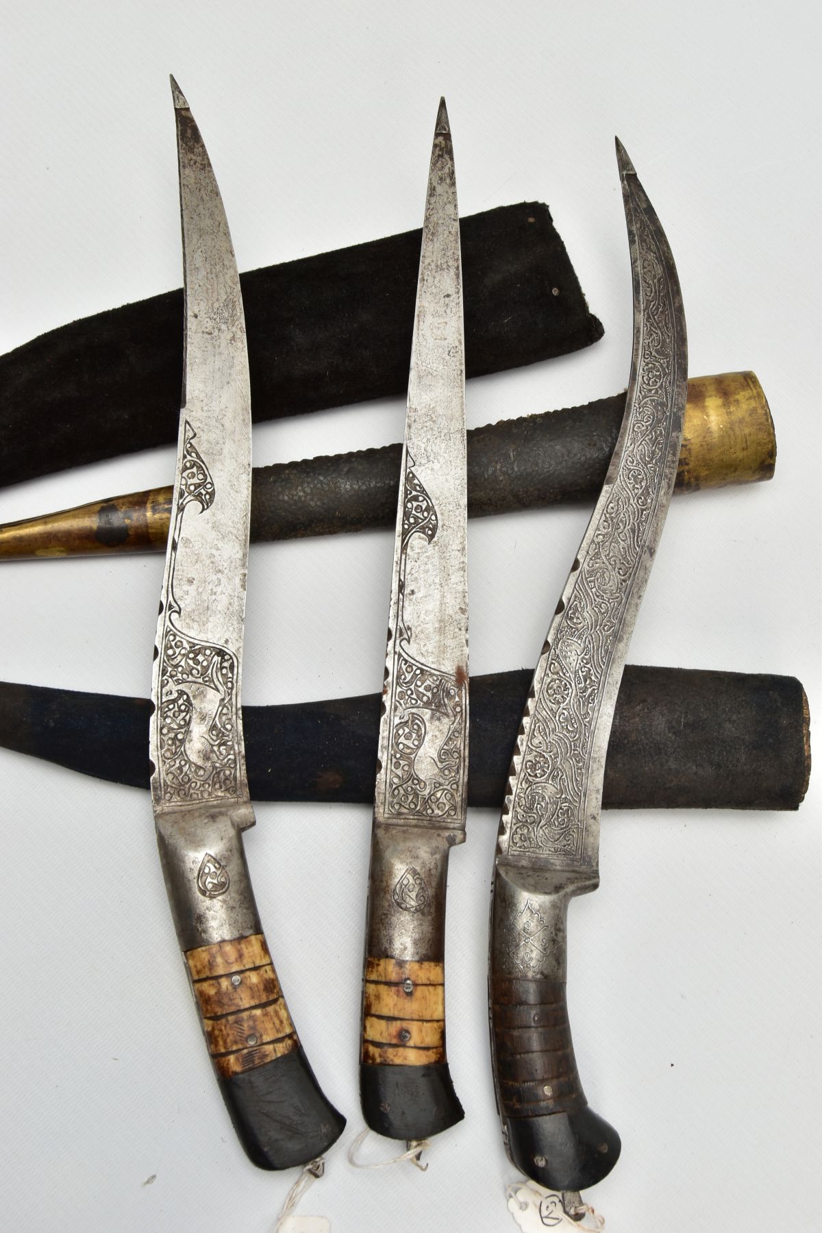 THREE INDIAN/ASIAN short daggers all with skin covered wooden scabbards, one with straight blade - Image 9 of 9