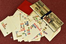 COLLECTION OF STAMPS ON QUANTITY OF PAGES, a small collection of early 20th C postcardsand an