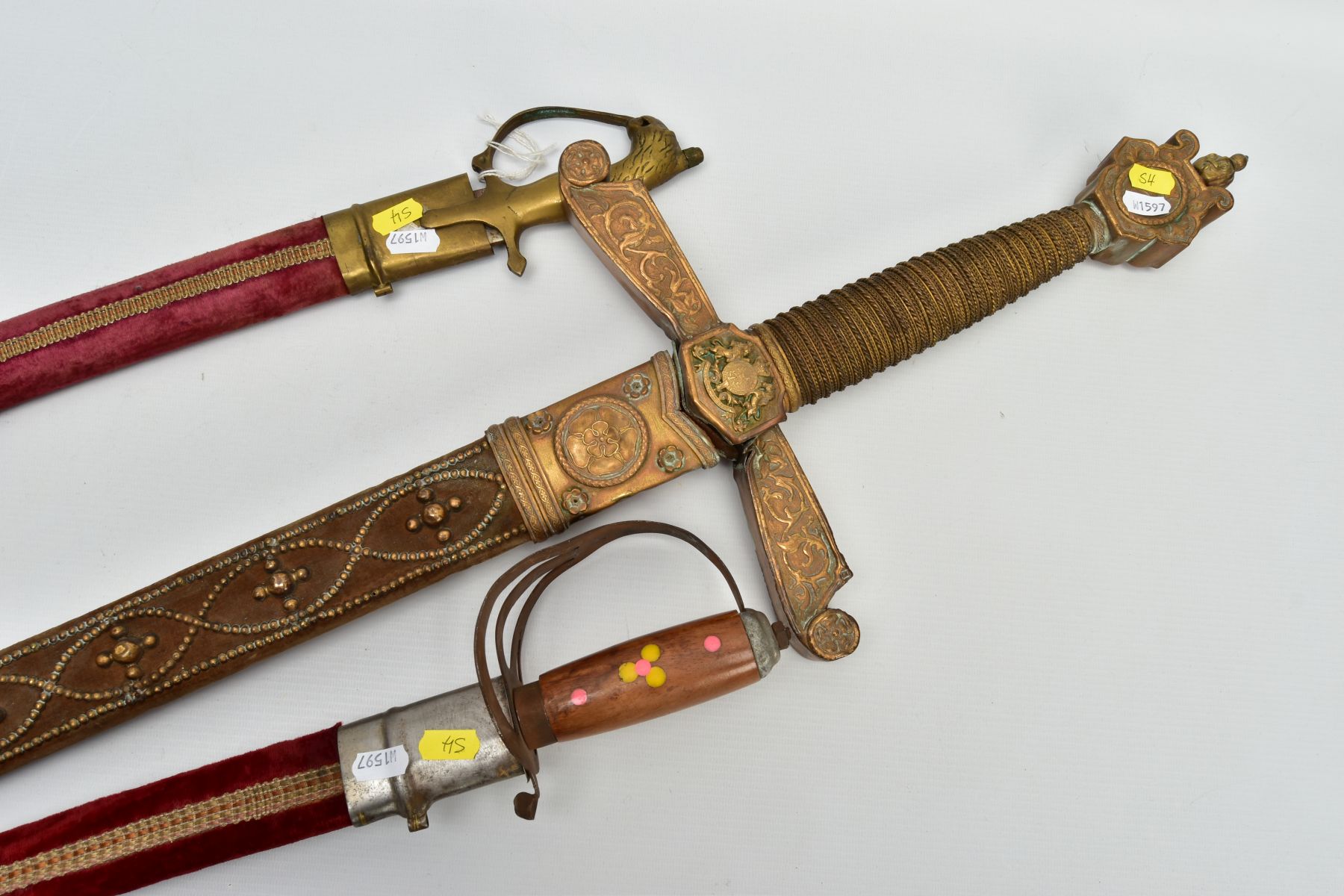 TWO ASIAN/INDIAN TOURIST STYLE CURVED SWORDS in wooden and suede scabbards, one id marked made in - Image 2 of 13