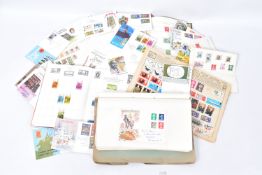 COLLECTION OF STAMPS IN FOUR ALBUMS and a range of GB first day covers