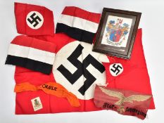 A SELECTION OF GERMAN 3rd REICH INSIGNIA, to include Swastika flag Bonnet recognition style,
