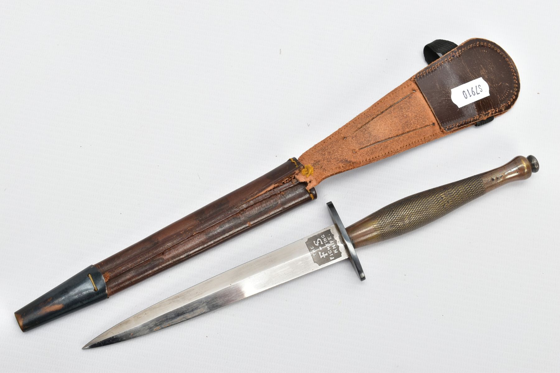 A FAIRBAIRN-SYKES FIGHTING KNIFE, complete with leather scabbard, this example is believed to be a - Image 4 of 7