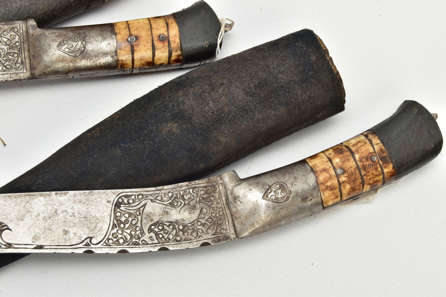 THREE INDIAN/ASIAN short daggers all with skin covered wooden scabbards, one with straight blade - Image 4 of 9