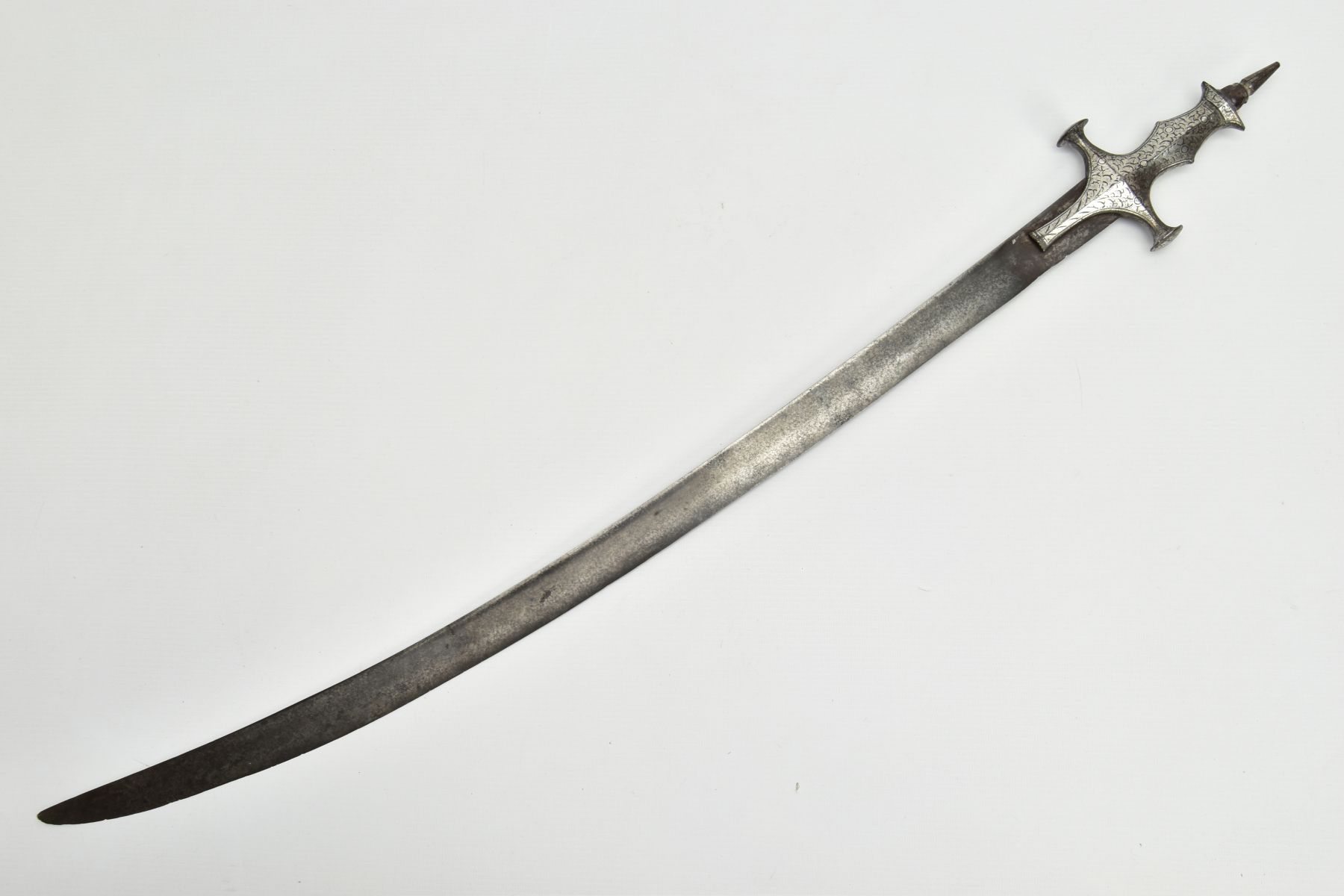 A TALWAR STYLE curved blade sword, blade length approximately 75 cm, ornate white metal grip and