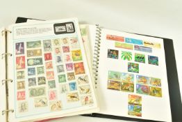 COLLECTION OF STAMPS IN TWO ALBUMS the first being a general worldwide collection, the second