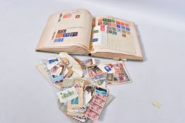 COLLECTION OF MID PERIOD WORLDWIDE STAMPS IN STRAND ALBUM AND LOOSE IN ENVELOPES