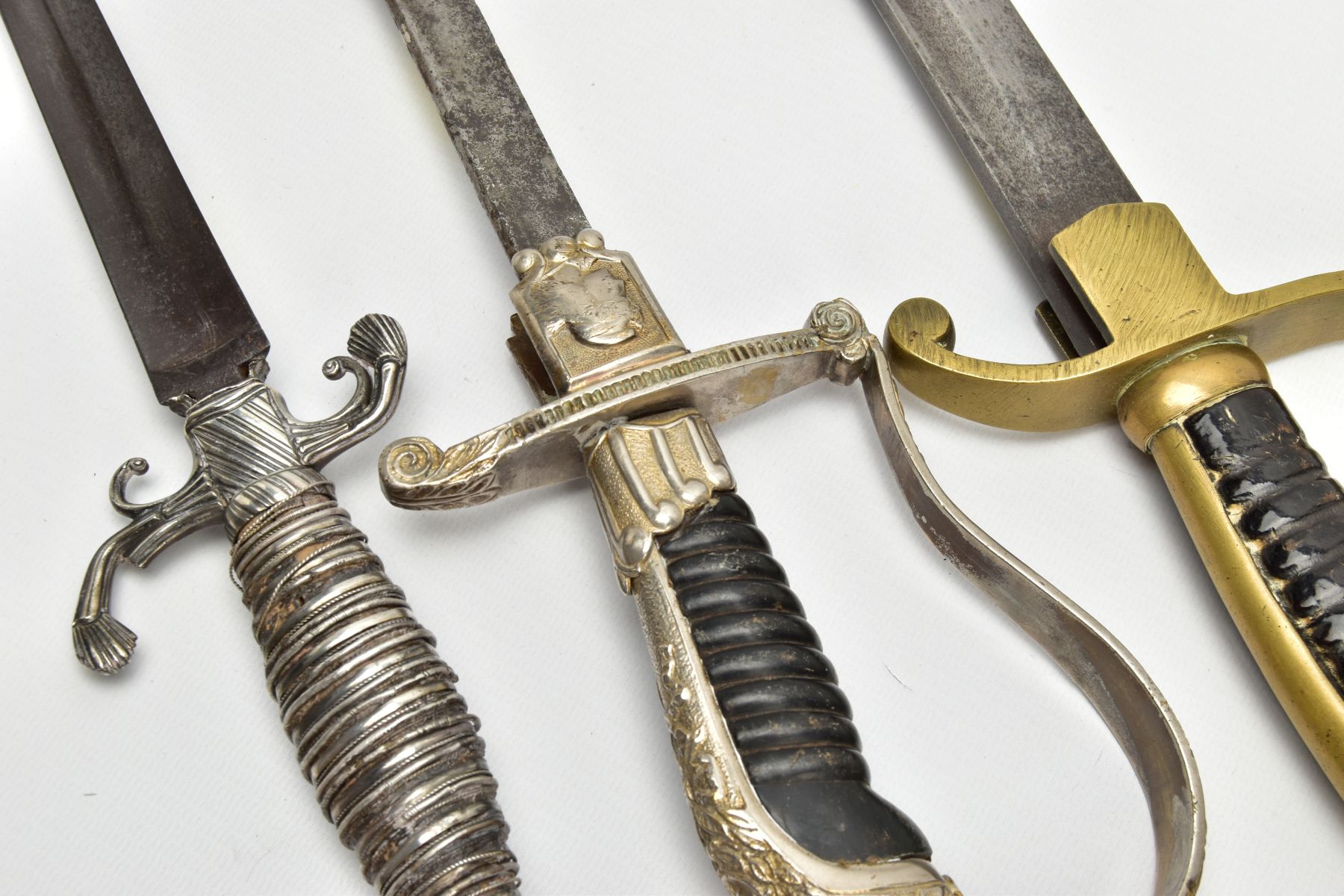 THREE SWORDS BELIEVED 19TH Century, a white metal ornate grip and cross guard blade tip broken, - Image 7 of 12