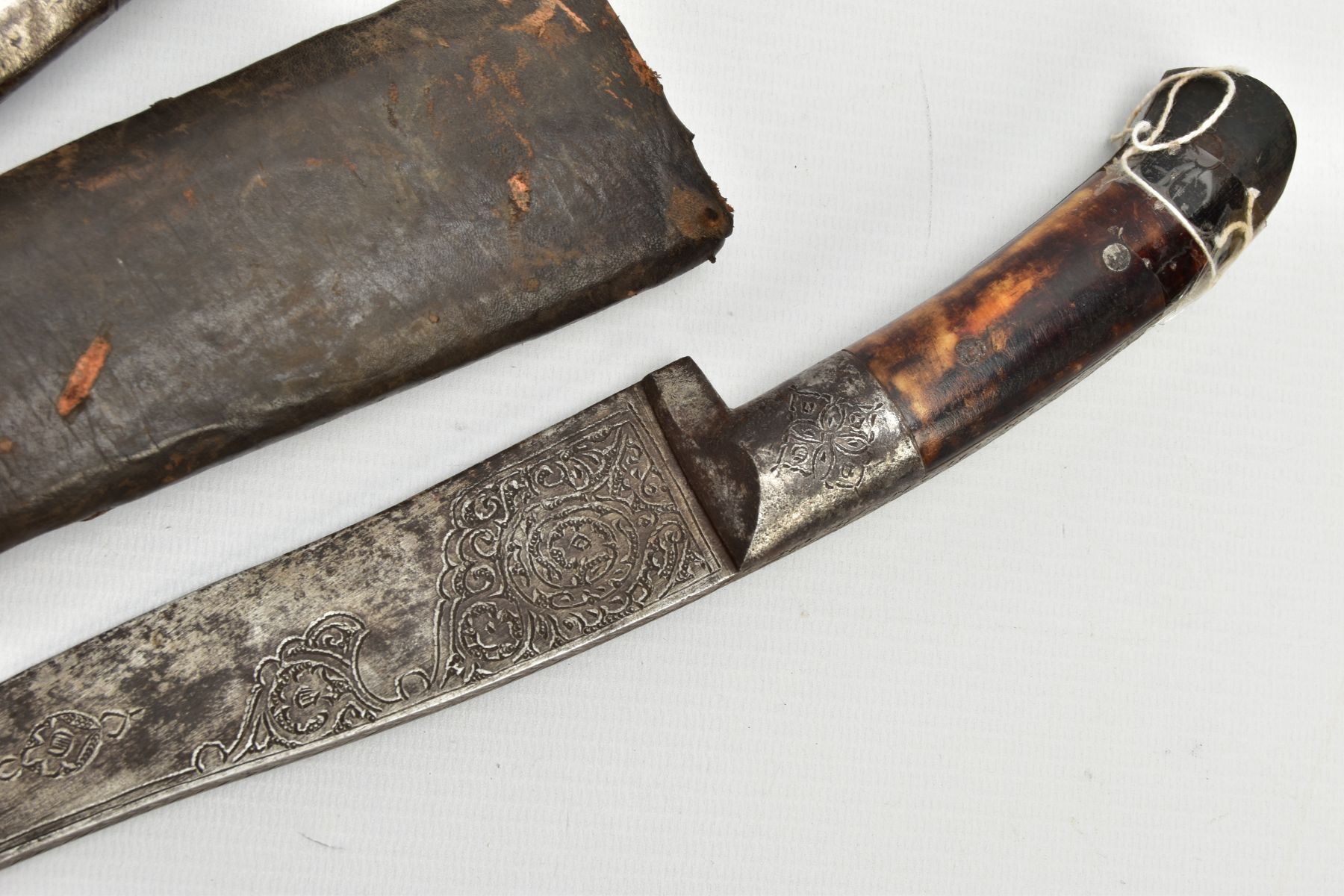 THREE INDIAN/ASIAN short daggers all with skin covered wooden scabbards, all curved and etched - Image 4 of 9