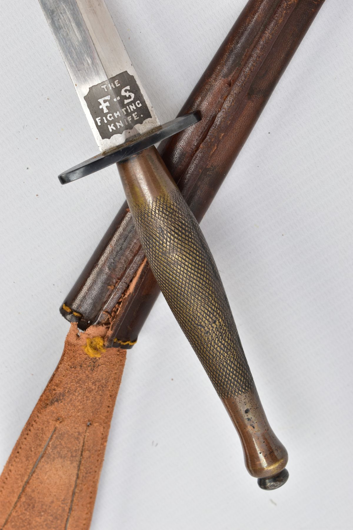 A FAIRBAIRN-SYKES FIGHTING KNIFE, complete with leather scabbard, this example is believed to be a - Image 5 of 7