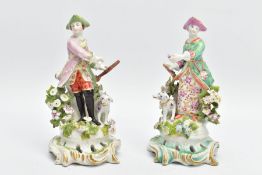 A PAIR OF BOW PORCELAIN FIGURES OF A SPORTSMAN AND HIS COMPANION, CIRCA 1765, he holding a gun to