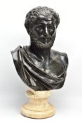 A LATE 19TH CENTURY HOLLOW CAST BRONZE BUST OF A CLASSICAL MALE ON A FAUX MARBLE PLINTH, the