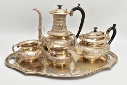 A MID 20TH CENTURY INDIAN SILVER FIVE PIECE TEA AND COFFEE SET ON A TWIN HANDLED OVAL TRAY,