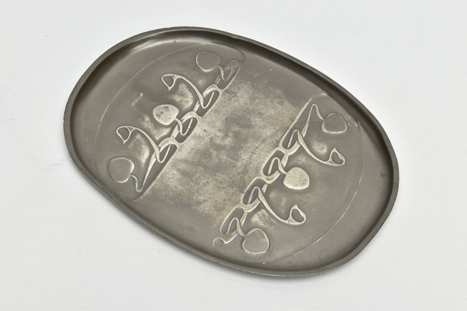 A TUDRIC PEWTER OVAL DISH, cast with a sinuous scrolling design, stamped 'Tudric 0164' to the - Image 2 of 5