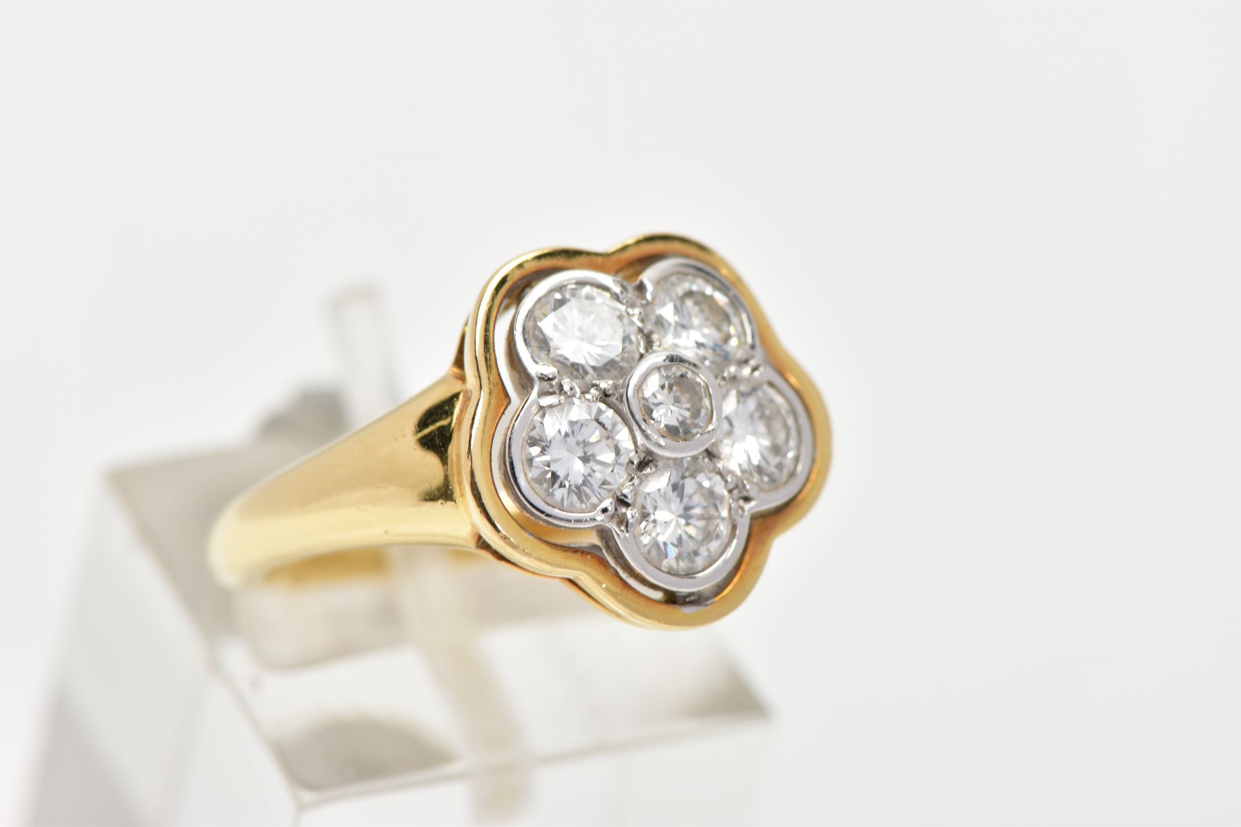 A MODERN DIAMOND CLUSTER RING, seven round brilliant cut diamonds, rim and grain set in a floral - Image 4 of 7