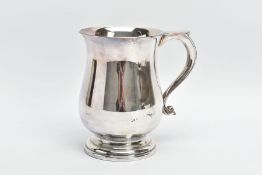 AN ELIZABETH II SILVER TANKARD OF BALUSTER FORM, S scroll handle, plain body, stepped circular foot,