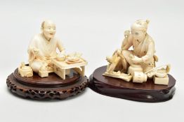 TWO JAPANESE MEIJI PERIOD IVORY OKIMONO, carved as a carpenter at work and the other a street food