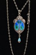 AN ART NOUVEAU SILVER AND ENAMEL PENDANT BY ABRAHAM & BINT, of a foliate form with blue and green