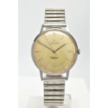 A STAINLESS STEEL ZENITH AUTOMATIC WRISTWATCH, deteriorating silvered dial with baton markers,