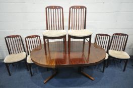 BENNY LINDEN DANISH CIRCULAR ROSEWOOD DINING TABLE, with one additional leaf, extended length