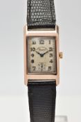 A 9CT GOLD HAND-WOUND RECTANGULAR WRISTWATCH, deteriorating cream dial signed 'Spinkins from Dent,