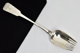 A GEORGE III IRISH SILVER FIDDLE PATTERN RUNCIBLE SPOON, engraved crest, maker James Keating,