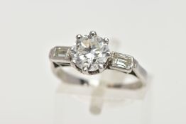 A MID TO LATE TWENTIETH CENTURY THREE STONE DIAMOND RING, principle round brilliant cut diamond claw