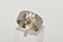 AN 18CT WHITE GOLD WEDDING BAND, a wide textured bark finish band, measuring approximately 7.9mm