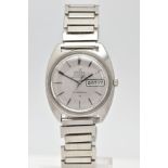 A STAINLESS STEEL AUTOMATIC OMEGA CONSTELLATION WRISTWATCH, silvered dial with baton markers, day-