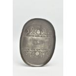 A TUDRIC PEWTER OVAL DISH, cast with a sinuous scrolling design, stamped 'Tudric 0164' to the