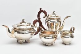 AN ELIZABETH II FOUR PIECE SILVER TEA AND COFFEE SERVICE, gadrooned rims, the tea and coffee pots