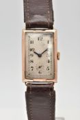 A 9CT GOLD HAND-WOUND RECTANGULAR CASED RECORD WRISTWATCH, deteriorating cream dial with Arabic