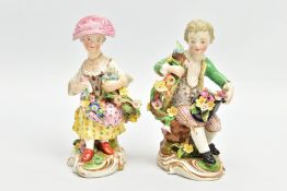 A PAIR OF LATE 18TH / EARLY 19TH CENTURY DERBY PORCELAIN FIGURES OF SEATED BOY AND GIRL GARDENERS,