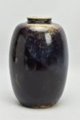 A RUSKIN POTTERY OVOID VASE, decorated with a dark purple flambe glaze, impressed 'RUSKIN ENGLAND
