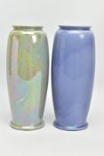 TWO RUSKIN POTTERY BALUSTER VASES, one in a lilac glaze with areas of iridescence, the other in a