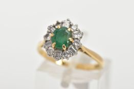 AN 18CT GOLD MID TO LATE TWENTEITH CENTURY EMERALD AND DIAMOND CLUSTER RING, centring on an oval