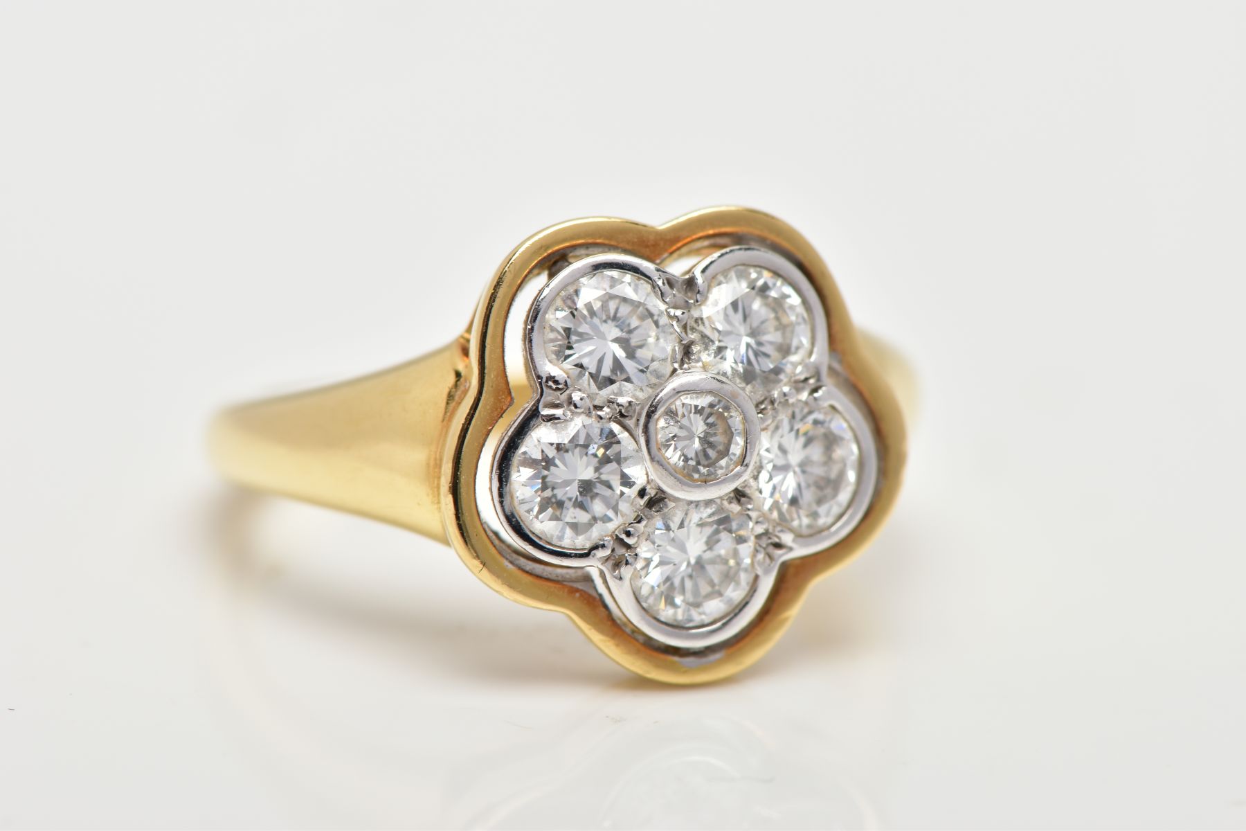 A MODERN DIAMOND CLUSTER RING, seven round brilliant cut diamonds, rim and grain set in a floral - Image 7 of 7