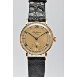 A 9CT GOLD CASED HAND-WOUND J.W.BENSON WRISTWATCH, round champagne dial with Roman numeral markers