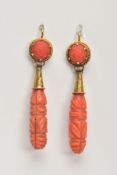 A PAIR OF LATE VICTORIAN CARVED CORAL DROP EARRINGS, each designed as an elongated drop carved