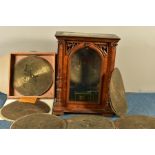 A LATE 19TH CENTURY WALNUT CASED FREESTANDING PENNY IN THE SLOT POLYPHON, the plinth top supported