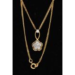 A MODERN 18CT GOLD DIAMOND CLUSTER DROP PENDANT AND CHAIN, a round flower cluster of brilliant cut