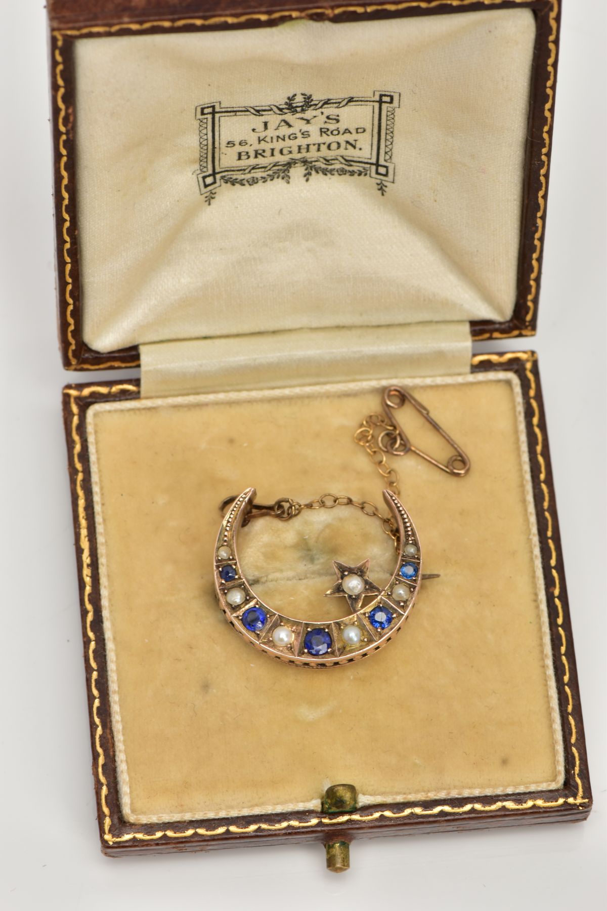 A LATE VICTORIAN 9CT GOLD SAPPHIRE AND SPLIT PEARL CRESCENT BROOCH, designed as circular sapphires - Image 7 of 7