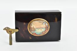 A 19TH CENTURY TORTOISESHELL SINGING BIRD AUTOMATON MUSIC BOX, the rectangular box with oval