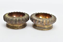 A PAIR OF VICTORIAN SILVER GILT CAULDRON SALTS, of compressed circular form with lobed decoration to