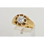 A DIAMOND SINGLE STONE RING, a round brilliant cut diamond claw set to tapering shoulders, estimated