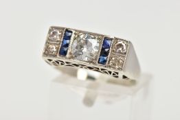 AN EARLY TWENTIETH CENTURY SAPPHIRE AND DIAMOND RING, centring on an early brilliant cut diamond