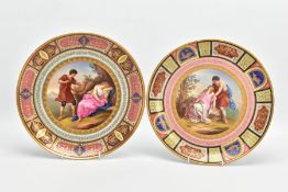 TWO LATE 19TH CENTURY VIENNA STYLE PORCELAIN CHARGERS, with polychrome and gilt borders